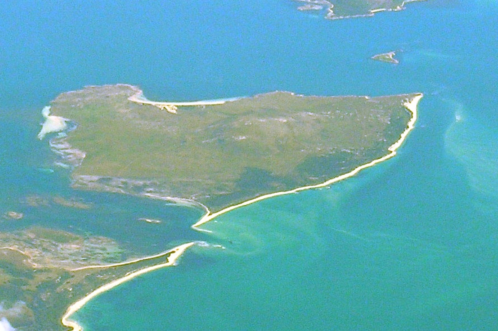 Aerial view of Gun Carriage Island, also called Vansittart Island, in the turquoise water of the Furneaux Group, Bass Strait